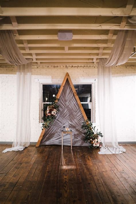 This Geometric Ceremony Backdrop Was Made By The Groom Features