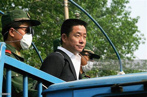 Chinese Police Escort Convicted Criminal Gang Leader Song Liugen For