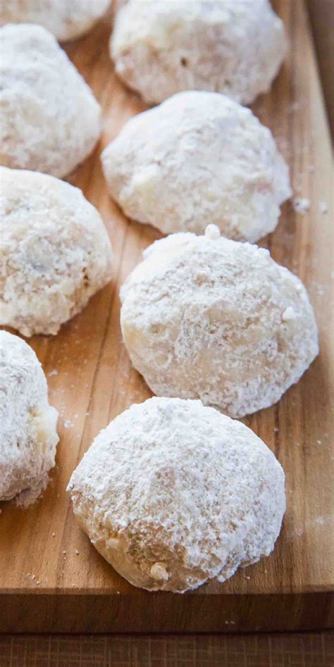 Dot center of each cookie with water, and top with a pecan half. Mexican Wedding Cookies | Recipe in 2020 | Tea cakes, Tea cookies, Wedding cake cookies
