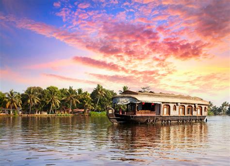 Relaxing Houseboat Cruise On The Backwaters Of Kerala In India