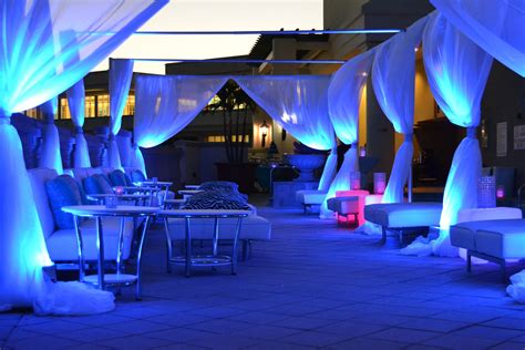 Miami Themed Rooftop Party Lounge Area With Couches Tables Led Up