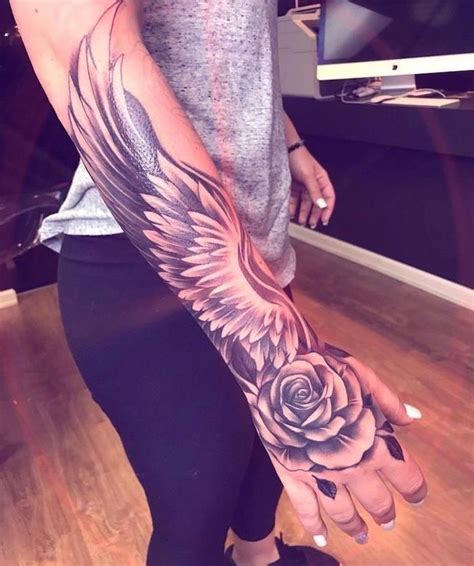 Angel Wings Tattoo Hand Tattoo Rose Woman With Grey Top Black Tights