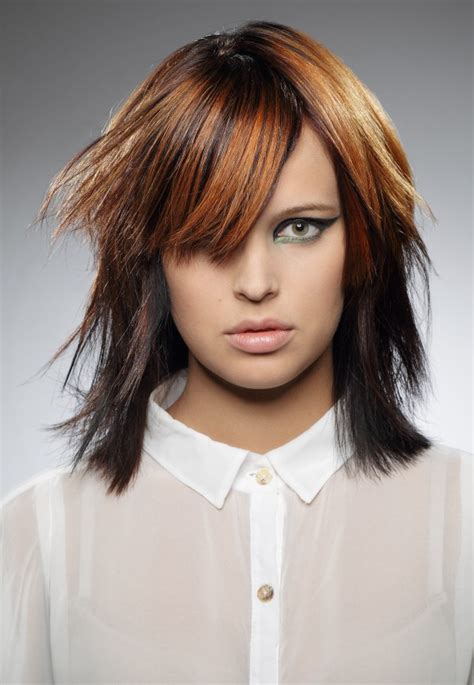 Medium length hairstyles and haircuts are perhaps the most universal styles, as they flatter every woman. Shoulder long hairstyle with jagged layers and a fringe ...