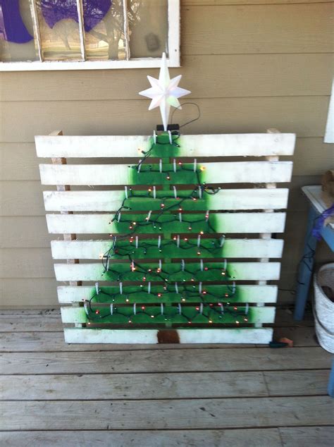A Christmas Tree Made Out Of Pallet Wood