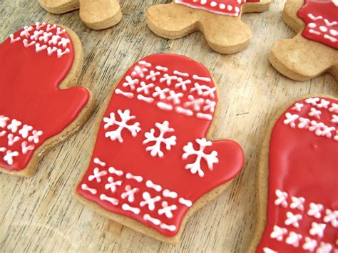 Soft christmas cookies in gingerbread man, candy cane, and tree shapes on a white plate credit: Jenny Steffens Hobick: Gingerbread Cookies | Christmas Cookies | Decorating Gingerbread Men