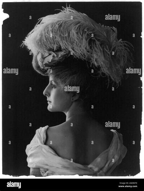 Young Woman Modeling Back View Head And Shoulders Wearing Feathered