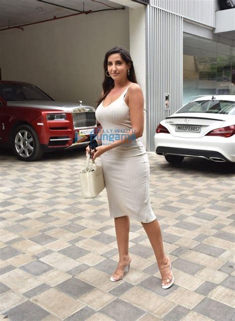 Nora Fatehi Steps Out In Beige Bodycon Dress With A Mini Handbag Bollywood News Bollywood
