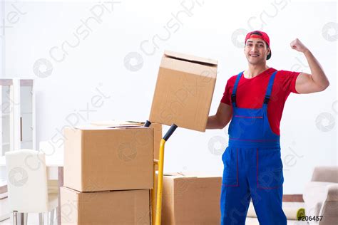 Contractor Worker Moving Boxes During Office Move Stock Photo