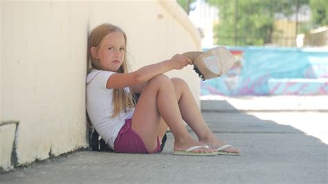 Homeless Girl Begging Alms In Street On Stock Footage SBV 325154051