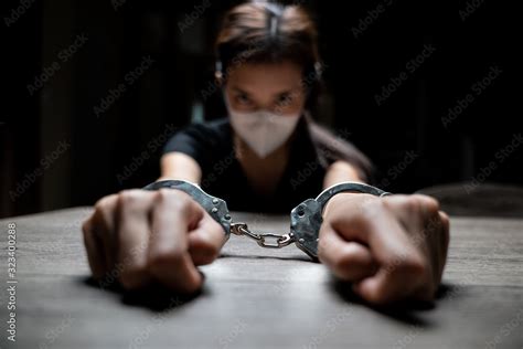 Handcuffed On A Prisoner Woman Prisoners Were Handcuff In The Dark Prison Photos Adobe Stock