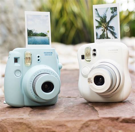 Instax Mini Instant Cameras Make Sharp Saturated Credit Card Sized Photos That Develop