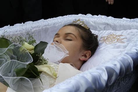 Beautiful women in their caskets. Andreea Brazovan in her open casket during her funeral ...