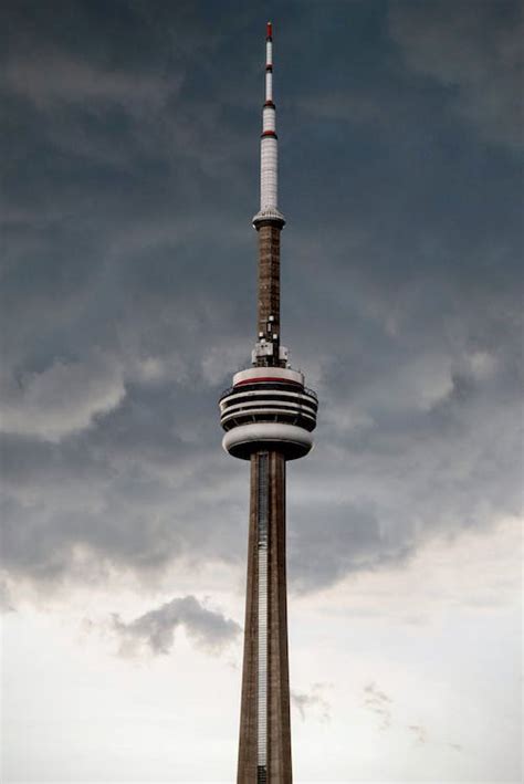Cn Tower Under Cloudy Sky · Free Stock Photo