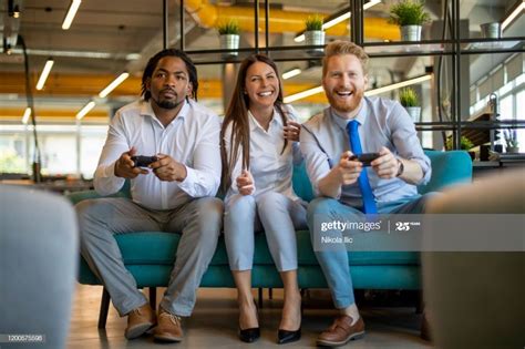 Virtual games to play with coworkers online. Coworkers Playing Video Games In Office Photography #Ad ...