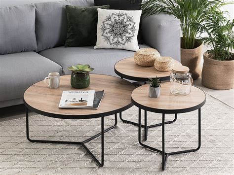 Making Your Living Room Look Great With A Round Light Wood Coffee Table