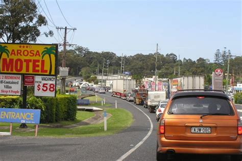 pacific highway traffic snarls at macksville will be remedied by next summer abc news