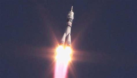 Crew Launches To Space Station With Olympic Torch Universe Today