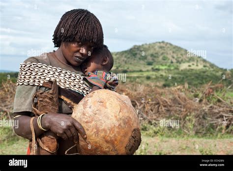 Mother And Child Belonging To The Banna Tribe Ethiopia Stock Photo