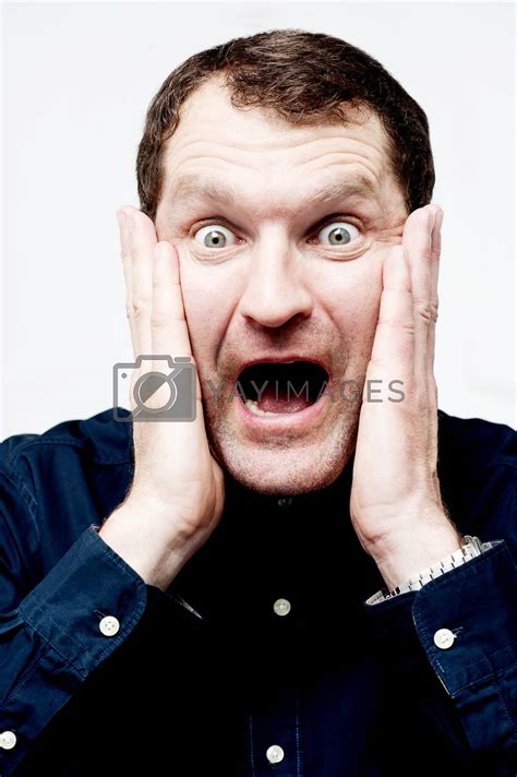 Man With Shocked Facial Expression By Stockyimages Vectors