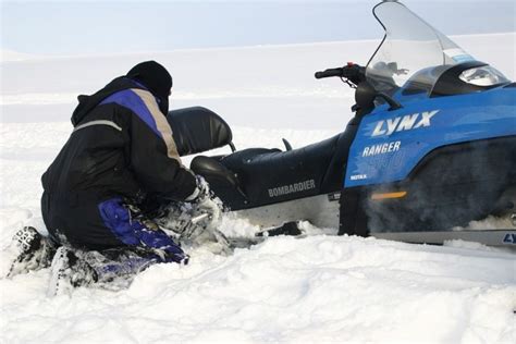 Snowmobile Stuck In The Snow Overcome This Crisis Smoothly