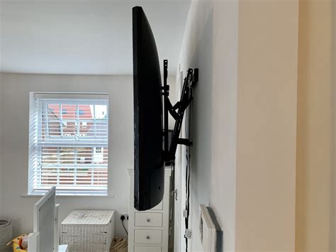 How To Wall Mount A Flat Screen Tv With A Tilting Wall Bracket Life