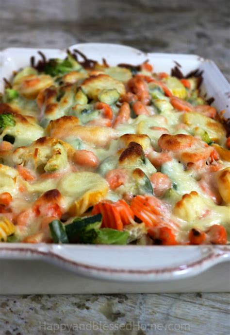 Lasagna noodles, mushrooms, spinach, and pasta sauce combine with ricotta cheese, romano cheese, oregano, basil, mozzarella cheese, and parmesan cheese. Easy Cheesy Chicken Vegetable Casserole