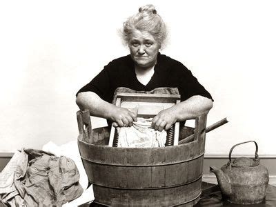 S S Senior Woman Washing Clothes In Old Fashioned Wooden Tub And Washboard