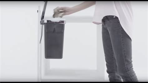 I am adding both a pull out. simplehuman in-cabinet door mounted trash can - YouTube