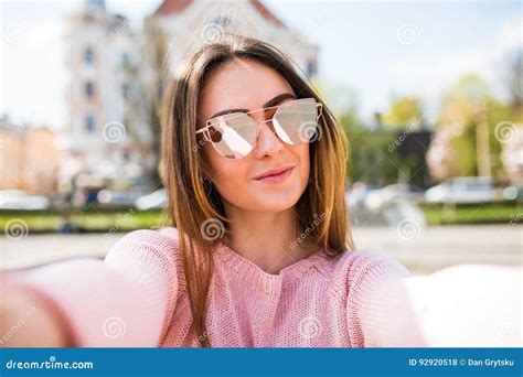 Young Woman Taking Selfie From Hands With Mobile Phone In Sunny City