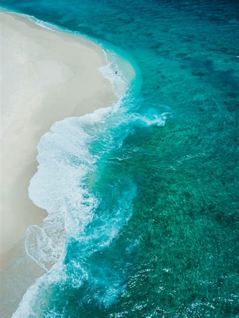 Download Wallpaper 2707x3612 Beach Waves Coast Aerial View Hd Background