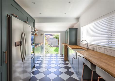 We get that even this popular kitchen design isn't always the opting for kitchen cabinets with a sleek finish is a great option if you're keen to design a galley because the rest of the scheme is pale so it adds contrast and you can tie in the green with herbs and. Copse Green Shaker Kitchen With Oak Worktops - Transitional - Kitchen - Manchester - by Kitchens ...