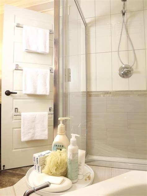 Most bar towel racks take up horizontal space, but this cozy dutch home shows how swapping them out for a vertical. Ways to Make Your Tiny Bathroom Look Bigger - Reliable ...