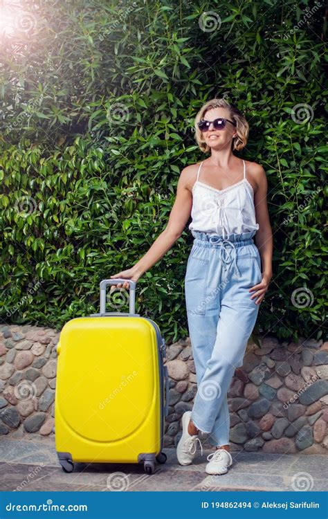 Woman With Luggage Outdoor Travel And Holiday Concept Stock Photo