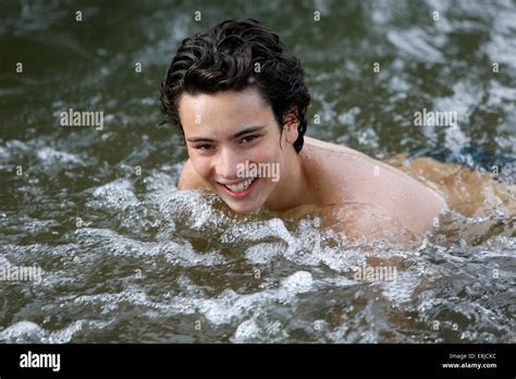 Boys Bathing In A River Stock Photo Alamy