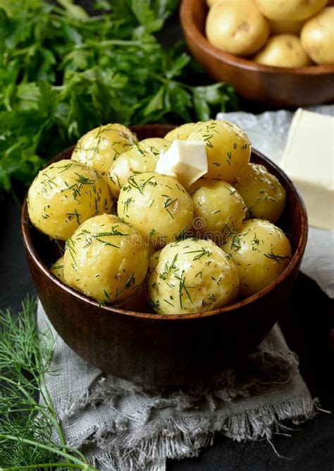 For a little heat, add a small pinch of crushed red chili flakes. New Boiled Potatoes With Dill And Butter Stock Image ...