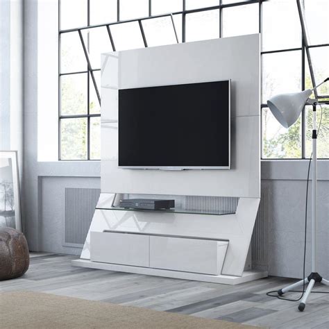 It has an extra space the white wall units of the entertainment center make the entire design gain in lightness, space, and. Manhattan Comfort Intrepid White Gloss Entertainment ...
