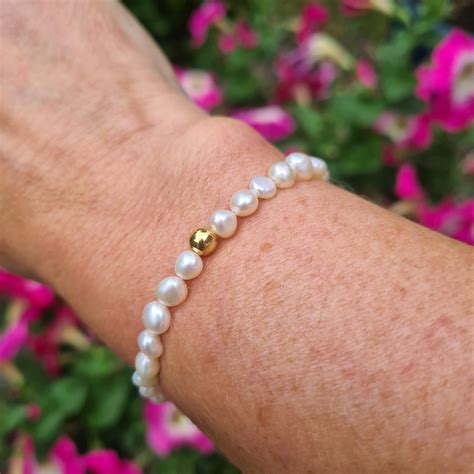 Tiny Freshwater Pearl Stretch Bracelet With A Sterling Silver Or 14ct