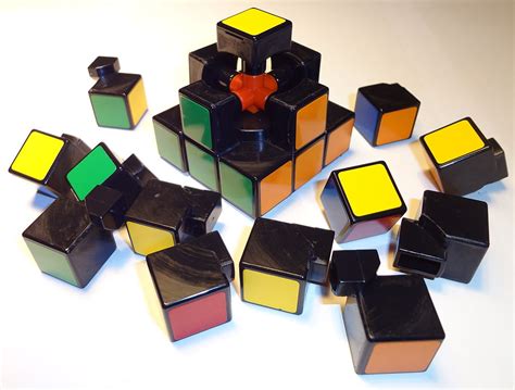 Let's take a look at how to take a rubik's cube apart:. File:Rubiks cube inside.JPG - Wikimedia Commons