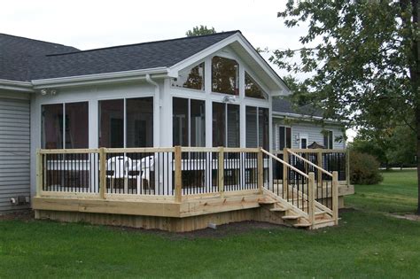 A House With A Deck And Screened Porch