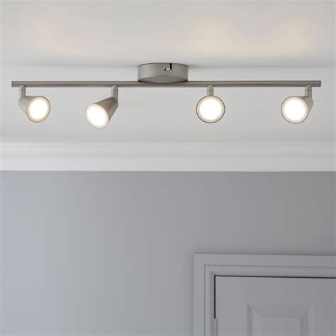This alani chrome plated ceiling light has a striking modern design and integrated led bulbs which illuminate to create beams of light. Koro Nickel effect 4 Lamp Ceiling spotlight | Departments ...
