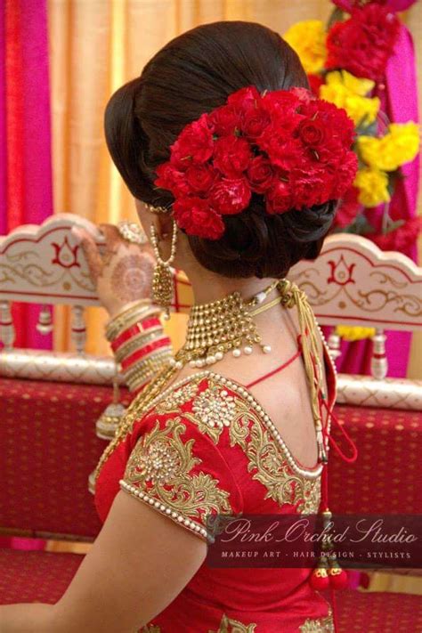 [click on the photo to book your wedding photographer] south indian bride hair style flower