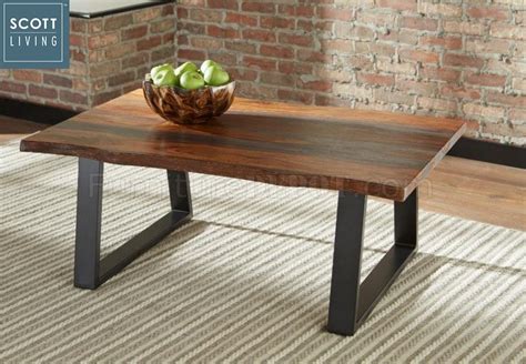 Crafted in india during the 19th century, this coffee table features a rectangular planked top with iron nailheads, sitting above an apron accented with iron braces in the corners. 721828 Coffee Table in Grey Sheesham - Scott Living by Coaster