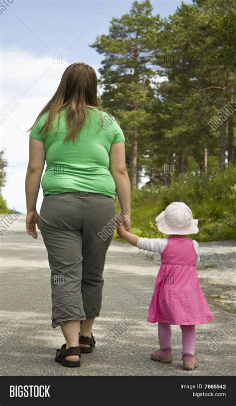 Obese Mother And Child Walking Stock Photo And Stock Images