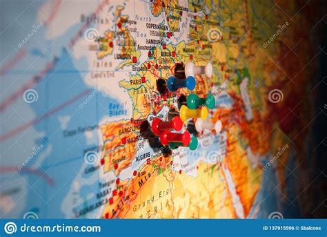 Close Up Of Colored Push Pins On A Geographical Map Stock Photo Image