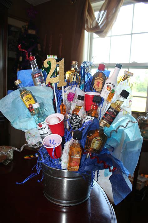 I attempted to make a birthday t basket for my. 21st birthday liquor basket! | 21st birthday gifts for ...