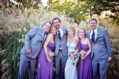 Styling inspiration for dashing groomsmen. Gray Groomsmen Suits and Purple Bridesmaid Dresses