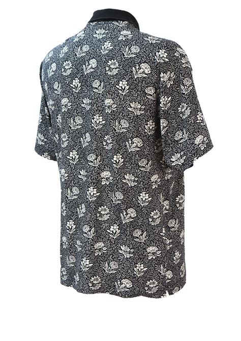 Black Polo Shirt with Intricate White Floral Pattern - L ...