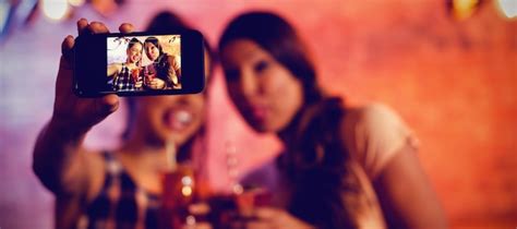 Premium Photo Young Women Taking A Selfie While Having Cocktail Drinks