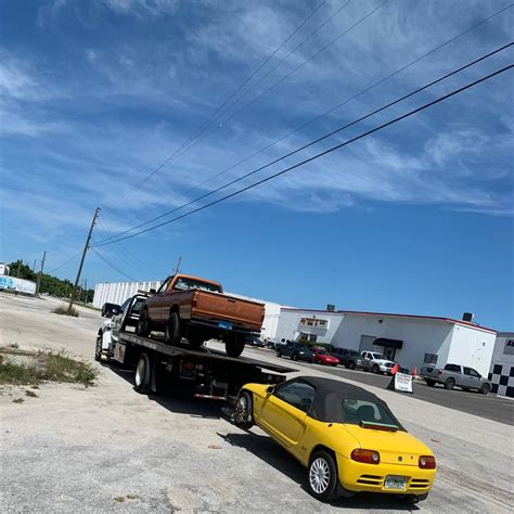 When the driver arrives to pick up your car, they'll hand you a check right then and there. Alex Towing Service - Towing Service in Tampa tow truck ...