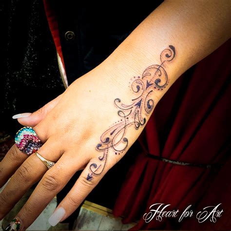 hand tattoos for women 16 tattooton